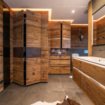 Komplettbadsanierung und Gästebad im alpinen Chalet Stil