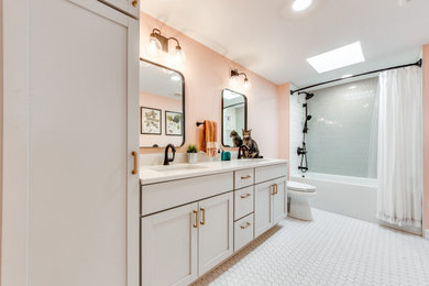 Mid-sized transitional green tile and ceramic tile ceramic tile, white floor and double-sink bathroom photo in St Louis with shaker cabinets, gray cabinets, a two-piece toilet, pink walls, an undermount sink, quartz countertops and white countertops
