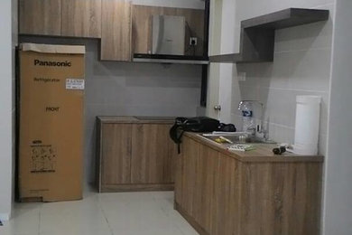 Example of an asian home design design in Other