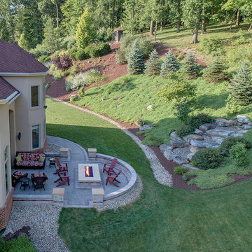 Hillside Luxury Landscaping with Linear gas Firepit
