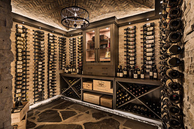 Design ideas for a mid-sized transitional wine cellar in Detroit with slate floors, storage racks and grey floor.