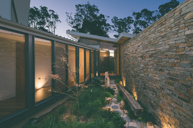 Design ideas for a contemporary home design in Central Coast.