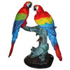 Two Bronze Beautiful Parrots On A Tree