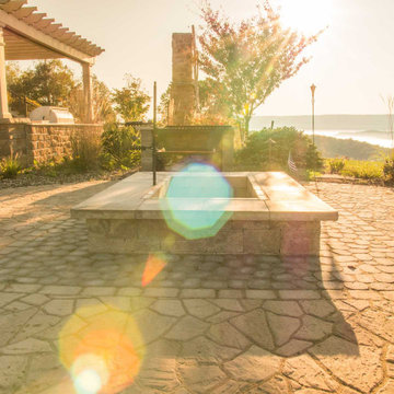 Fire pit and cobblestone pavers with flagstone