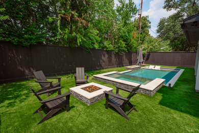 Inspiration for a small mid-century modern backyard rectangular pool remodel in Houston with a bbq area