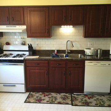 cabinet refacing with countertops and backsplash