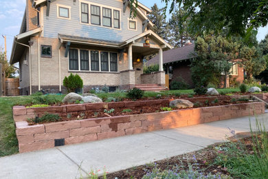 Inspiration for a mid-sized craftsman front yard landscaping in Denver for summer.