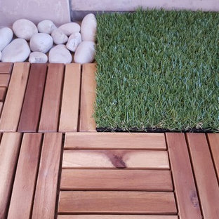 Inspiration for a small modern terrace and balcony in Venice with an awning.
