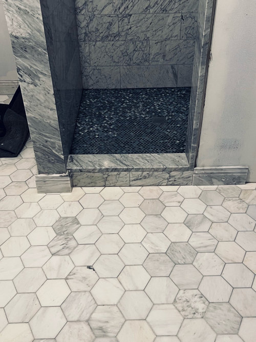 Help! Shower curb doesn’t line up with pony wall.