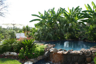 Inspiration for a small coastal backyard stone natural pool fountain remodel in Other