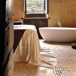 Master Bathrooms in antique limestone - Tile