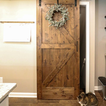 Cream Kitchen with Rushbrooke Eternia Quartz and Barn Doors