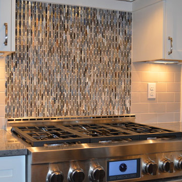 Kitchen With Large Center Island and Separate Cooking Area