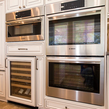 Transitional Kitchen in White With Some Traditional Flavors
