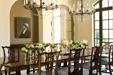 Example of a classic dark wood floor and brown floor enclosed dining room design in DC Metro with beige walls