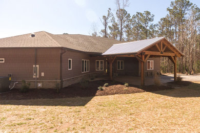 Large brown house exterior idea in Other