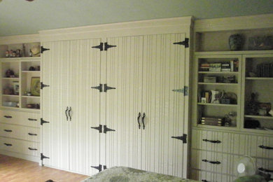 Mid-sized mountain style gender-neutral reach-in closet photo in Other with white cabinets