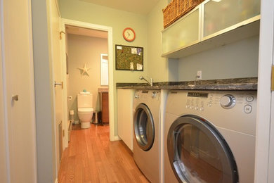 Laundry room - contemporary laundry room idea in Vancouver
