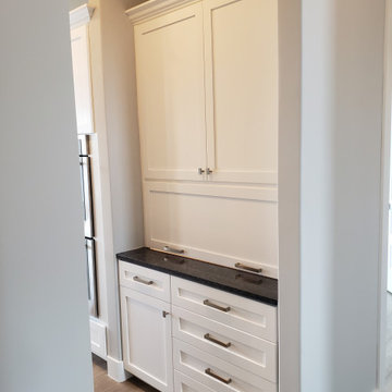 White shaker with auto open trash bin