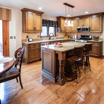 Refaced Raised Panel Ceiling Height Cabinets with Crown Molding