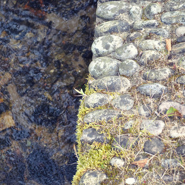 Stone/ brick etc landscape elements.
