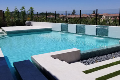 Trendy pool photo in Orange County