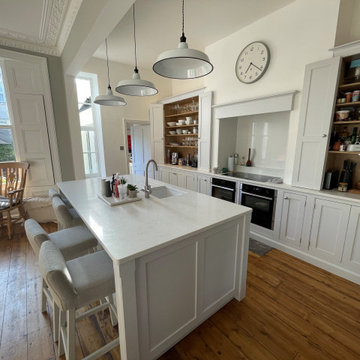 Neutral, open planned handmade kitchen.