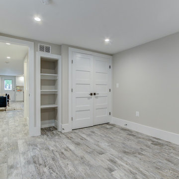 Basement remodeled with bedroom space and extra closet space in Quincy