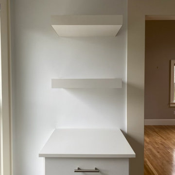 Boston area custom closet with floating shelves