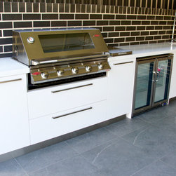 Outdoor Kitchen and Bar | polished concrete top island with timber front - BBQs