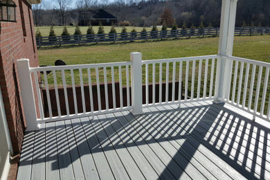 Design ideas for a modern deck in Louisville with mixed railing.