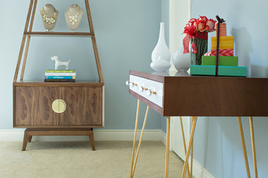 Home office - modern freestanding desk carpeted home office idea in Houston with blue walls