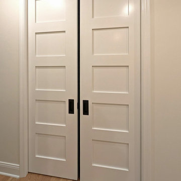 Panoramic Penthouse: White Four-Panel Sliding Pocket Doors