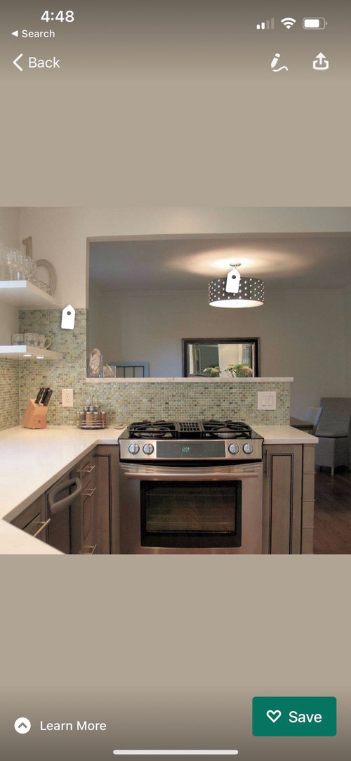 Quartz overhang over gas range?