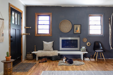 Example of a cottage entryway design in Other