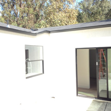 Modern Home with 3" Black Smooth Gutter System