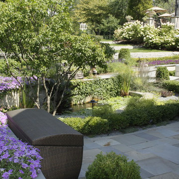 Full Landscape with Patio, Outdoor Kitchen, Stone Driveway and Planting