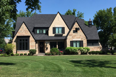 Example of a french country exterior home design in Chicago