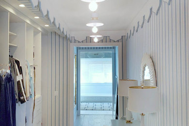 Example of a classic closet design in Other