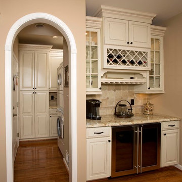Custom Cabinets, Arched Windows and Doors Provide This Kitchen Its Character