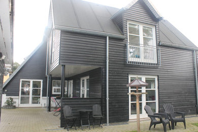 Design ideas for a rustic house exterior in Aarhus.