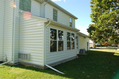 Mid-sized traditional exterior home idea in Other
