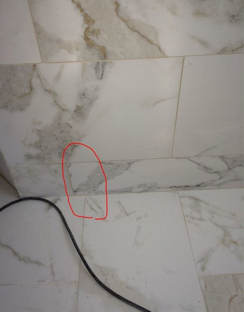 Tile didn't line up-- Should we have the tile work re-done?
