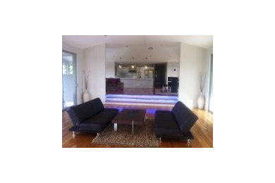 Design ideas for a large modern living room in Brisbane.