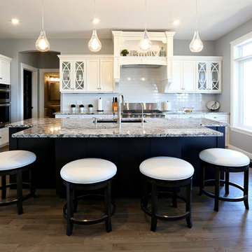 White Lacquered Cabinetry with Rich Dark Wood Island