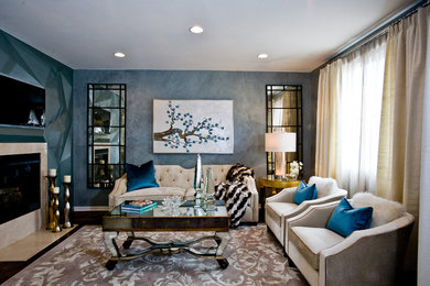 Living room - mid-sized contemporary formal and open concept dark wood floor living room idea in Miami with blue walls, a standard fireplace, a concrete fireplace and a wall-mounted tv