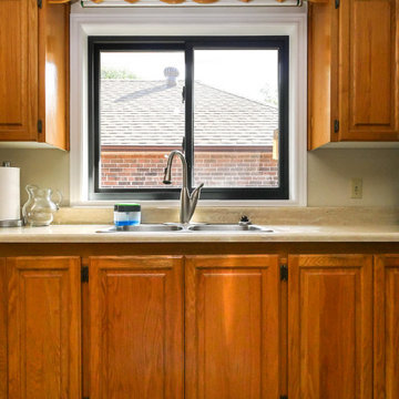 Pleasant Kitchen with New Black Window - Renewal by Andersen Greater Toronto