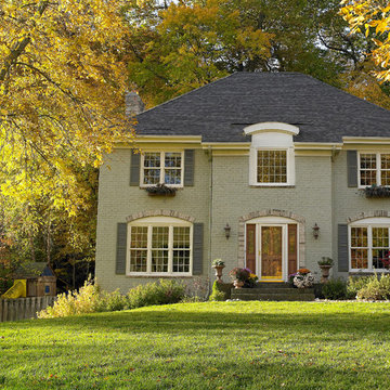 Double Hung Windows with Grille on Brick Home (Exterior)