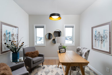Example of an arts and crafts home office design in Other