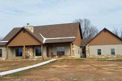 Rustic exterior home idea in Other